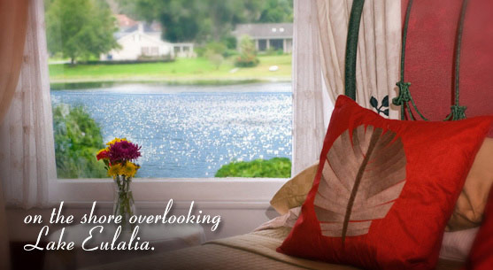 View of picturesque Lake Eulalia from guest room at our Orlando bed and breakfast